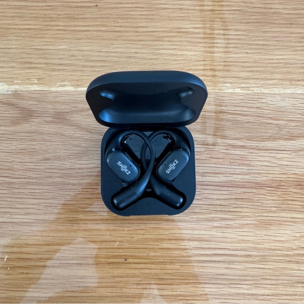 Shokz Open Fit bone conducting headphones. Used. Includes charging case.